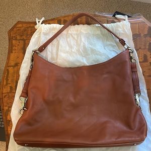 100% Soft Leather Hobo Bag in beautiful Pumpkin Color and Silver Hardware